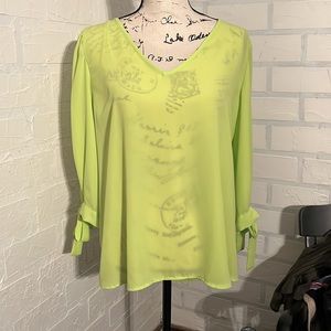 Beautiful lime green v neck blouse- armpit to armpit. 20” length 24”